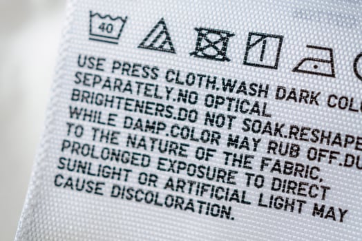 Cloth label tag with laundry care instructions photo
