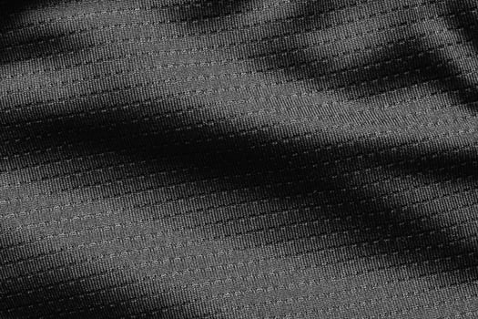 Black sport cloth fabric football shirt jersey texture close up photo