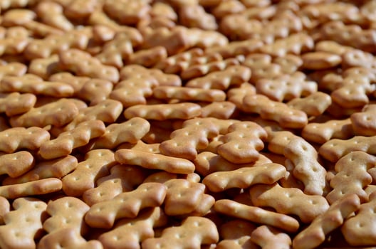 Pattern of a many yellow salted crackers photo