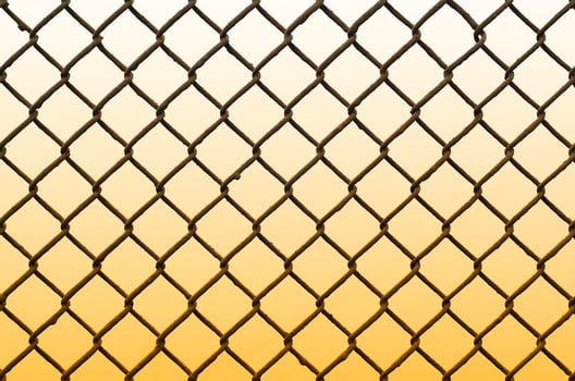 Texture of an old and rusty metal mesh on a neutral colored background photo