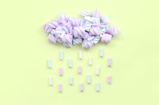 Marshmallow rain cloud. Cute metaphorical weather concept photo