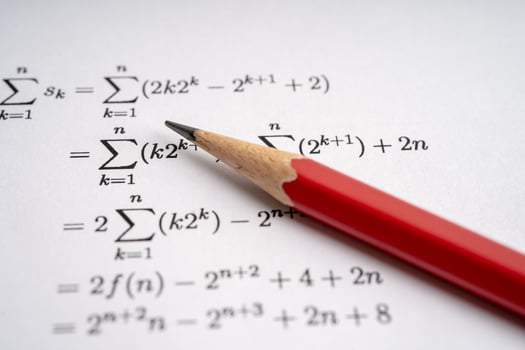 Pencil on mathematic formula exercise test paper in education school. photo