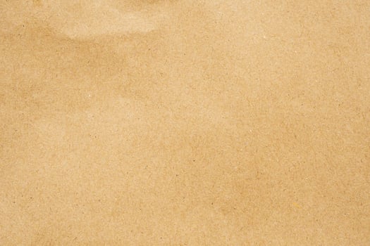 Brown paper eco recycled kraft sheet texture cardboard background photo