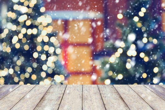 Christmas holiday background with empty wooden table photo