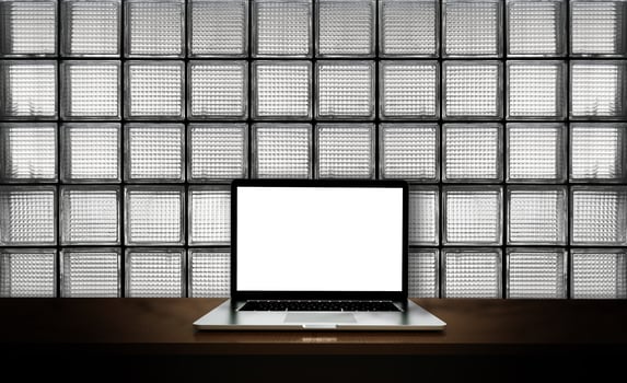 Modern laptop  isolated on green leaf background. 3D illustration. photo