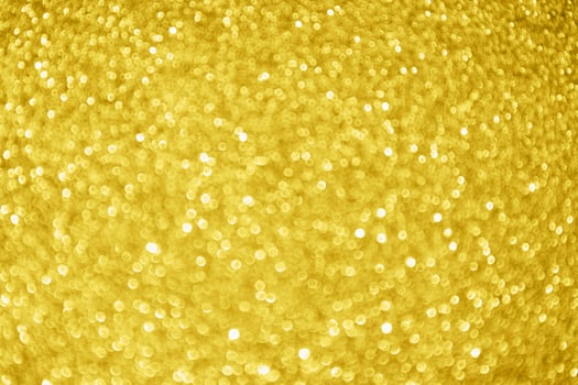 Abstract gold glitter sparkle bokeh light background photo