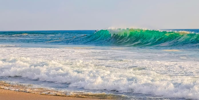 Extremely huge big surfer waves at beach Puerto Escondido Mexico. photo