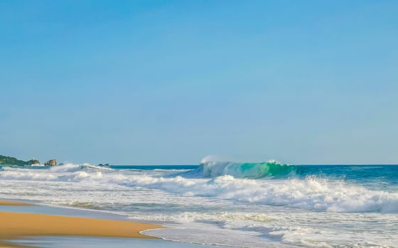 Extremely huge big surfer waves at beach Puerto Escondido Mexico. photo