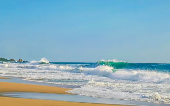 Extremely huge big surfer waves at beach Puerto Escondido Mexico. photo