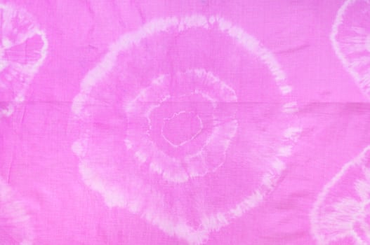 fragment of abstract pattern of pink scarf photo