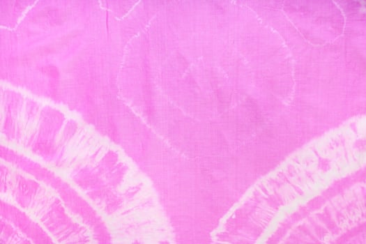 fragment of abstract ornament of pink scarf photo
