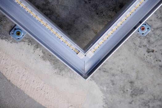 LED strip with aluminum profile on rough ceiling photo