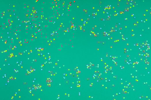 Christmas pattern green paper colorful confetti photo