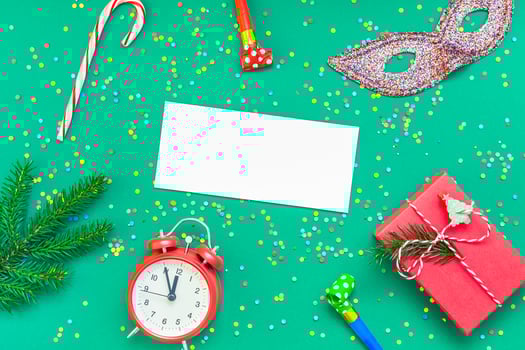 Christmas pattern flat lay with red alarm clock photo