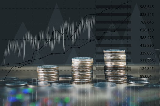 Financial stock market graph and rows of coins concept rows of coins lined up There is a graph showing growth and savings to plan for independent spending photo