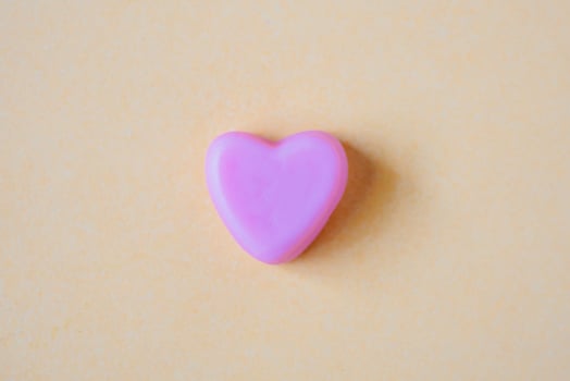 Valentines day background with heart shape candy photo