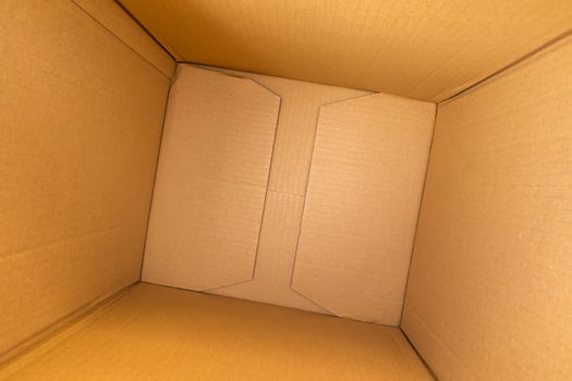 Open empty brown cardboard box background top view photo