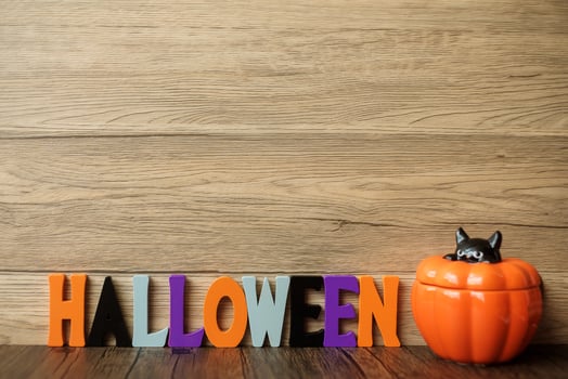Happy Halloween day with ghost, pumpkin,  bowl and decorative. Trick or Threat, Hello October, fall autumn, Festive, party and holiday concept photo