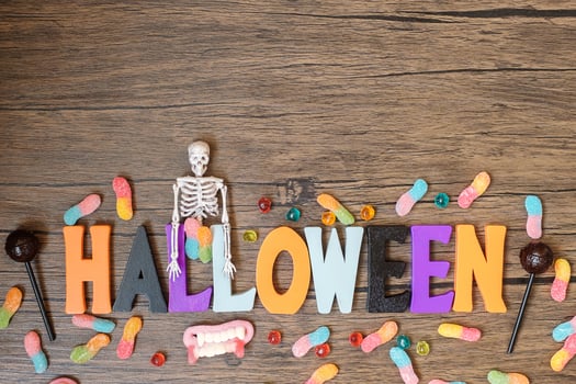 Happy Halloween day with ghost candies, pumpkin,  bowl and decorative. Trick or Threat, Hello October, fall autumn, Festive, party and holiday concept photo