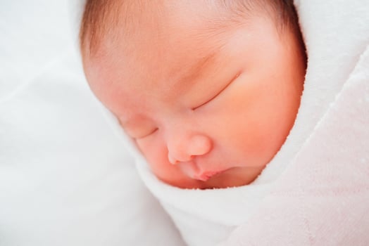 Newborn baby girl sleeping photo