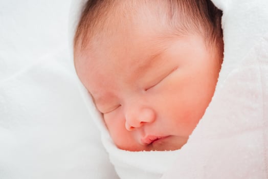Newborn baby girl sleeping photo