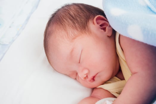 Newborn baby girl sleeping photo