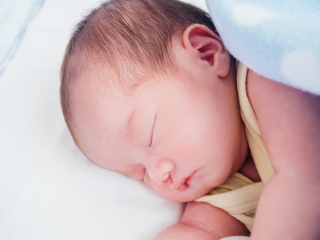 Newborn baby girl sleeping photo