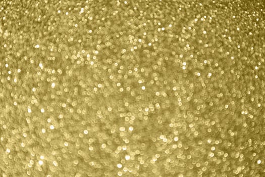 Abstract gold glitter sparkle bokeh light background photo
