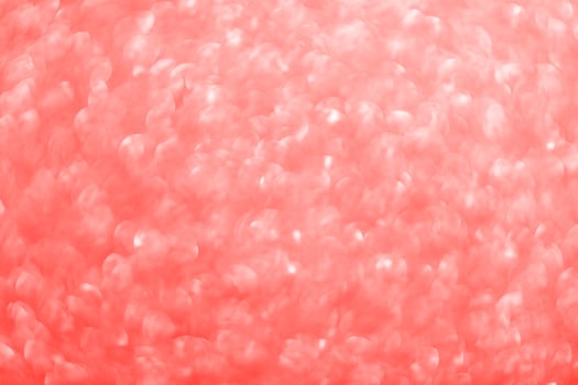 Abstract red glitter sparkle with bokeh light background photo