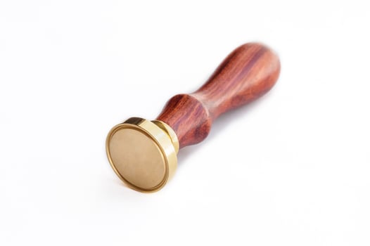 metal head stamp tool with wooden handle photo