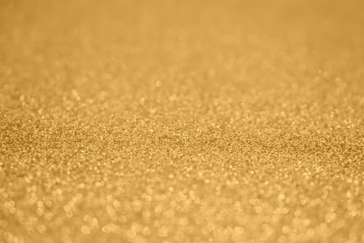 Abstract gold glitter sparkle background photo