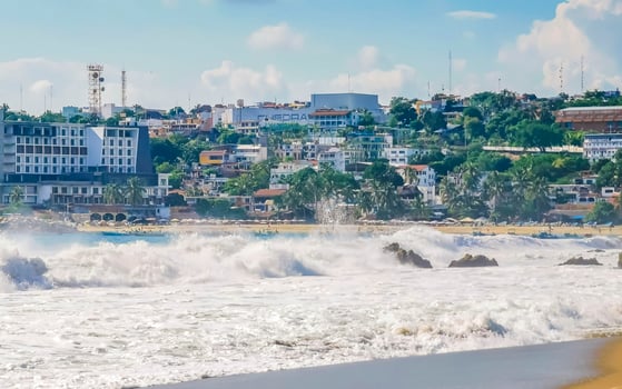 Extremely huge big surfer waves at beach Puerto Escondido Mexico. photo