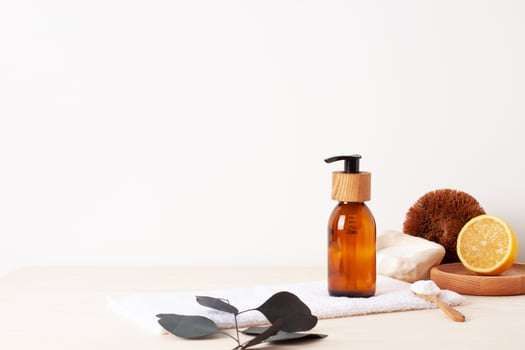 Zero waste, sustainable and eco-friendly lifestyle. Set of eco friendly natural cleaning products on white background. Close up, copy space. photo