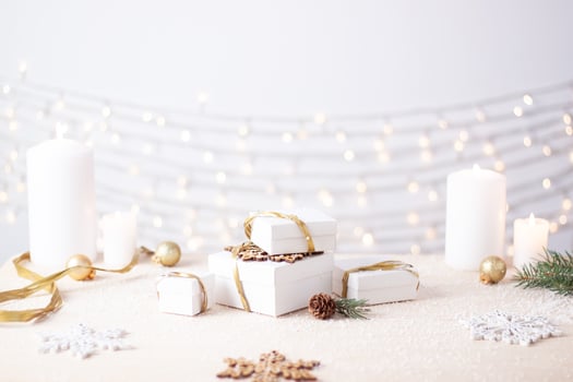 Christmas decorations with gifts on white background. Close up, copy space photo