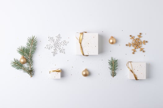Christmas decorations with gifts on white background. Flat lay, copy space photo