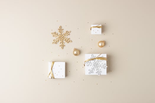 Minimal composition with Christmas decoration and balls on pastel beige background. Flat lay, copy space photo
