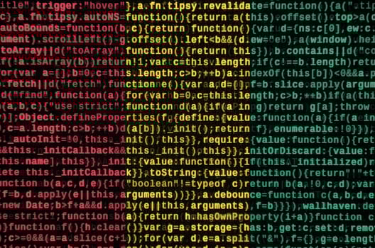 Guinea flag  is depicted on the screen with the program code. The concept of modern technology and site development photo