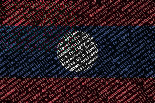 Laos flag  is depicted on the screen with the program code. The concept of modern technology and site development photo