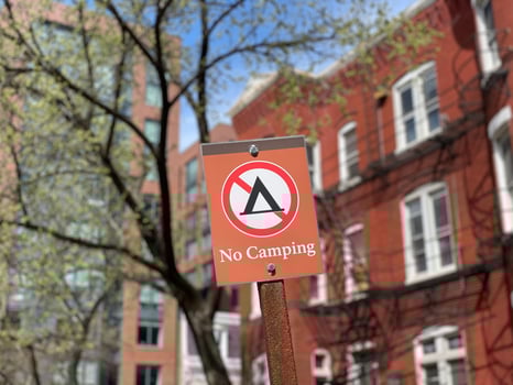 No Camping Sign in a park in Washington, DC in the spring. photo