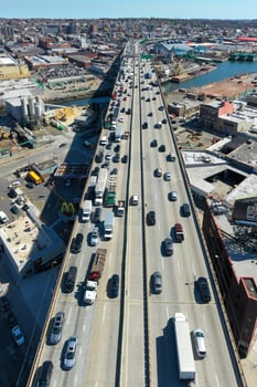 Brooklyn, New York - Apr 8, 2021 -  Panoramic view of the Gowanus Expressway in Brooklyn, New York with the Manhattan skyline in the background. photo