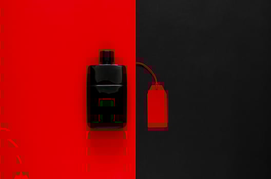 Red price tags with discount merchandise on red and black background. Black Friday concept. photo