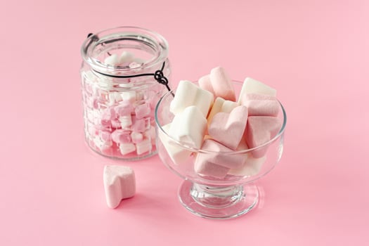 marshmallow heart shape and mini with love concept on pink background photo