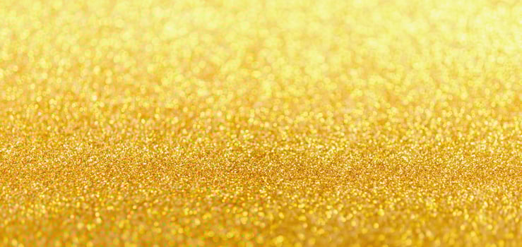Abstract gold glitter sparkle with bokeh light background photo