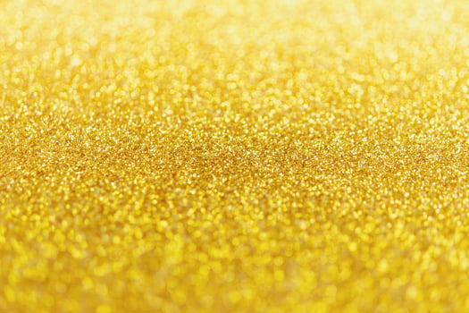 Abstract gold glitter sparkle with bokeh light background photo