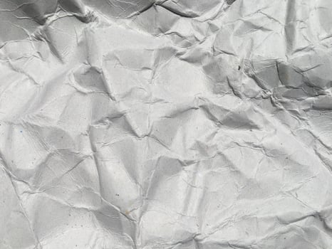 Top view of white crumpled paper texture background. Copy space for design and artwork photo
