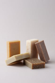 Soap on grey background. Close up, copy space photo
