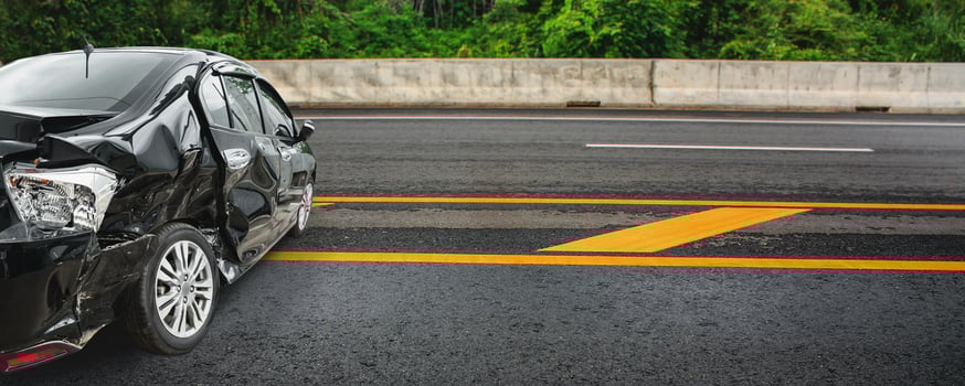car crash damaged from accident on highway road photo