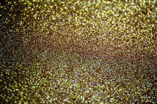 Abstract gold glitter sparkle texture background photo
