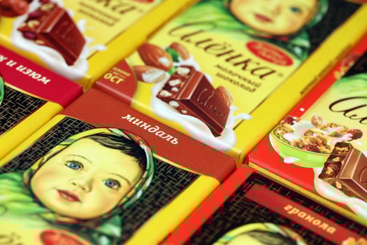 KHARKIV, UKRAINE - JANUARY 27, 2021 Alyonka chocolate square bars - product from Red October chocolate factory. Old russian traditional chocolate photo