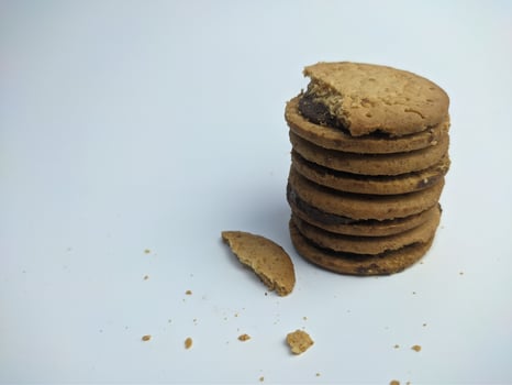 Sandwich biscuits, filled with chocolate, isolated on white background photo